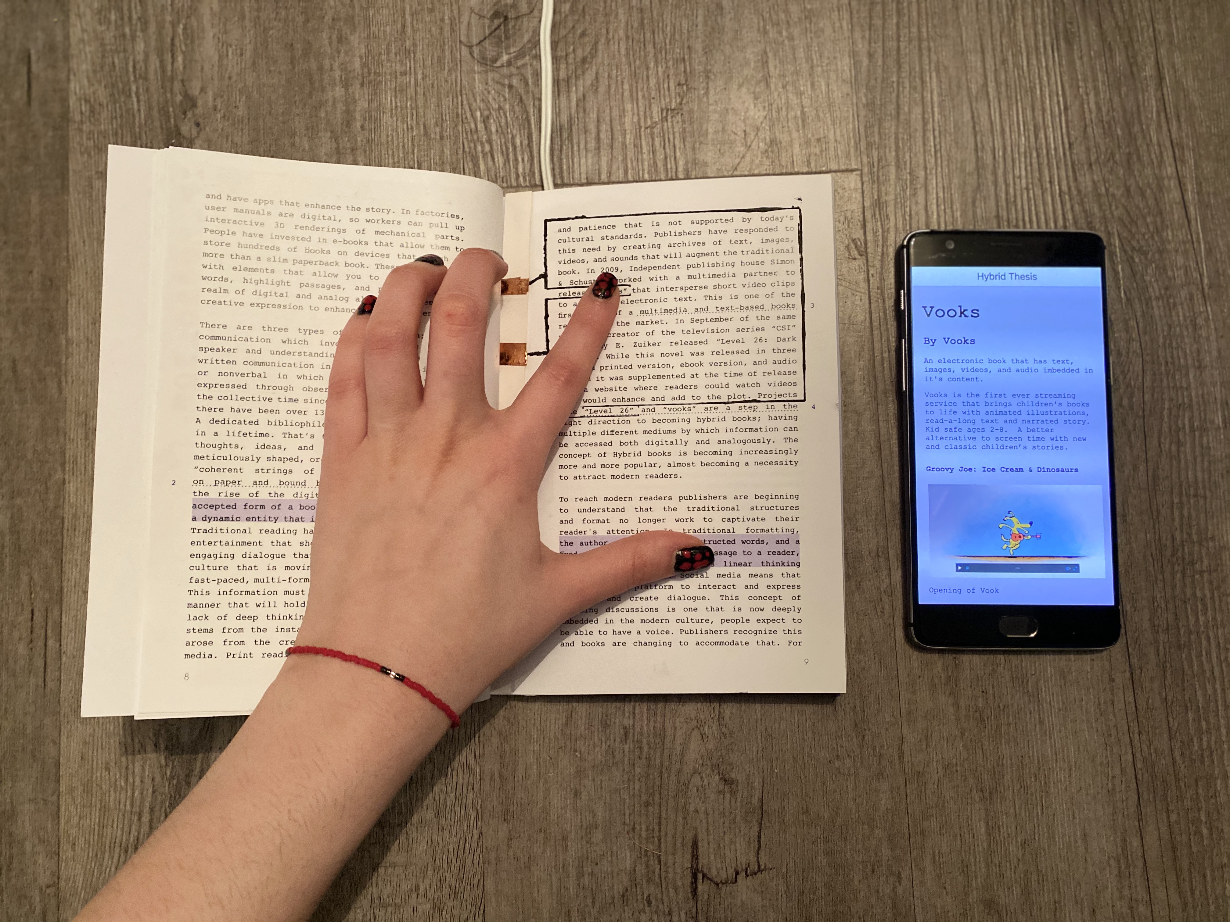 Hybrid book prototype front view showing conductive ink circuits